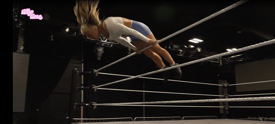 Tiffany Stratton executing a maneuver over the top rope